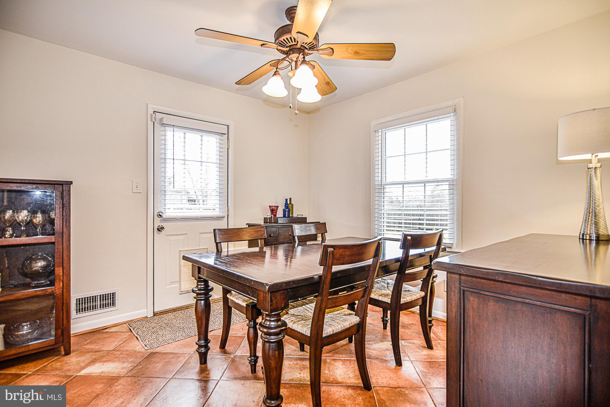 8608 Artillery Road Manassas, VA 20110 - Photo 16 of 31 DINING ROOM WITH EXIT DOOR TO DECK