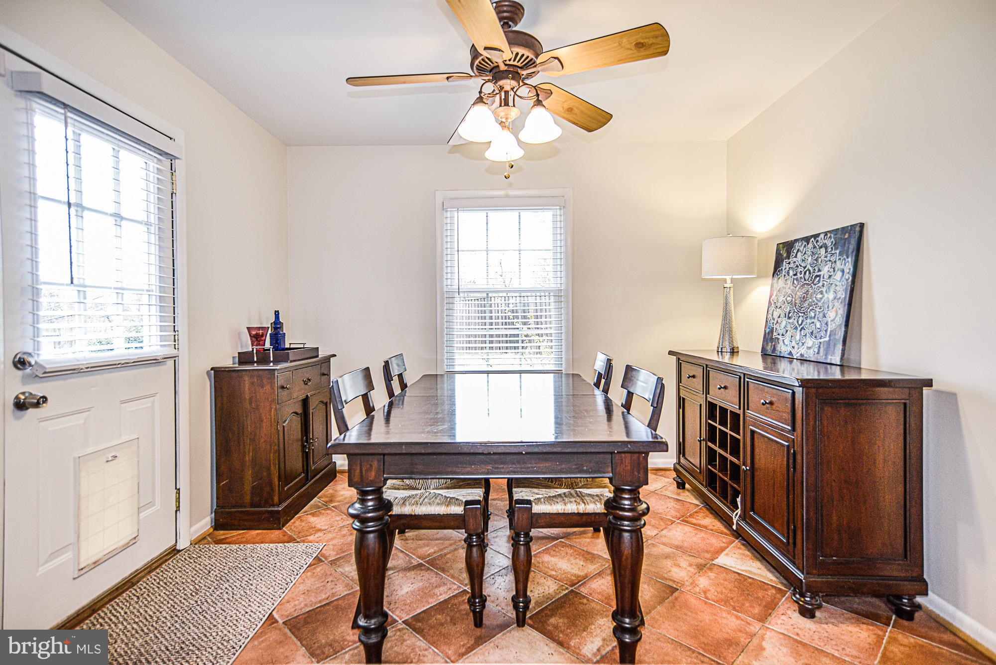 8608 Artillery Road Manassas, VA 20110 - Photo 17 of 31 DINING ROOM WITH TILED FLOOR AND NEW PAINT