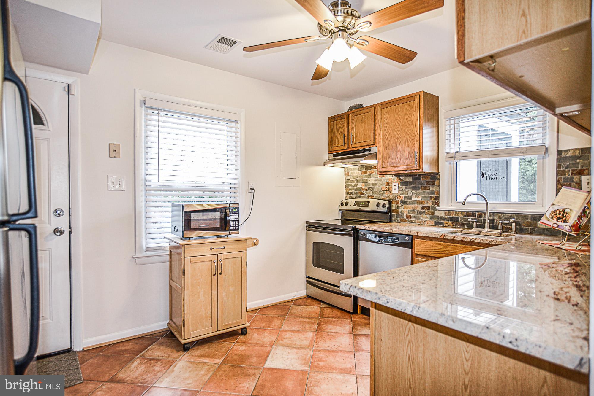 8608 Artillery Road Manassas, VA 20110 - Photo 18 of 31 KITCHEN VIEW WITH GARAGE ENTRANCE