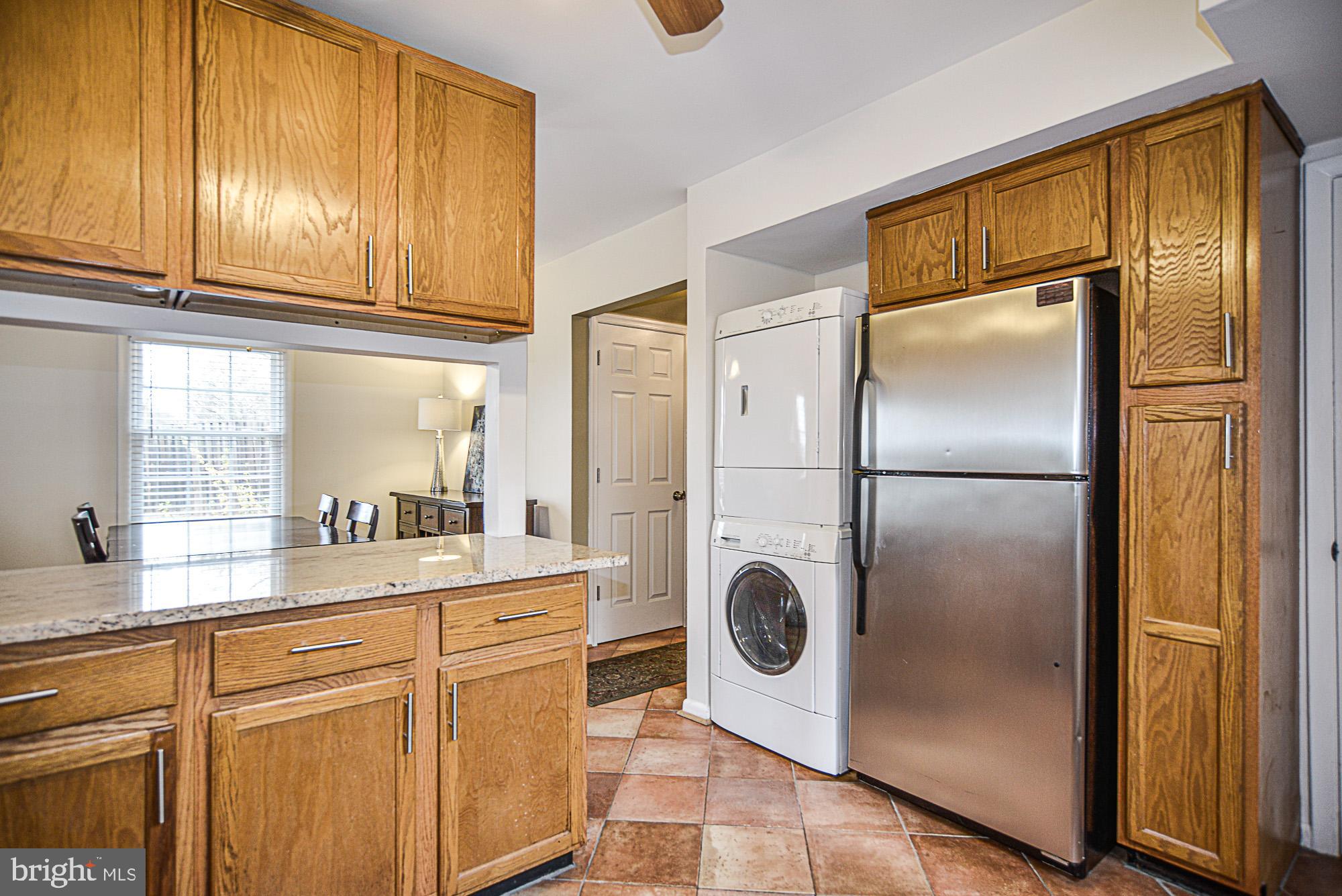 8608 Artillery Road Manassas, VA 20110 - Photo 21 of 31 KITCHEN WITH WASHER/DRYER