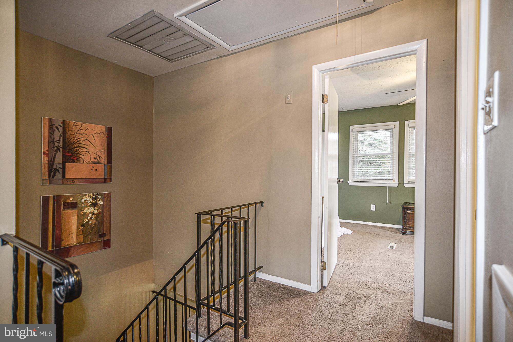 8608 Artillery Road Manassas, VA 20110 - Photo 22 of 31 UPPER LEVEL SHOWING PULL DOWN ATTIC ACCESS