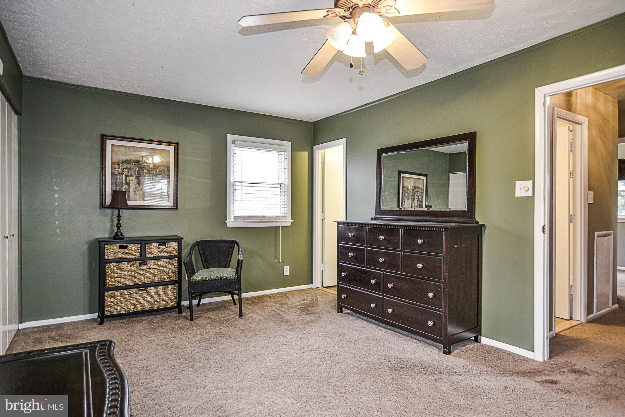 8608 Artillery Road Manassas, VA 20110 - Photo 24 of 31 MASTER BEDROOM SHOWING EN-SUITE BATH