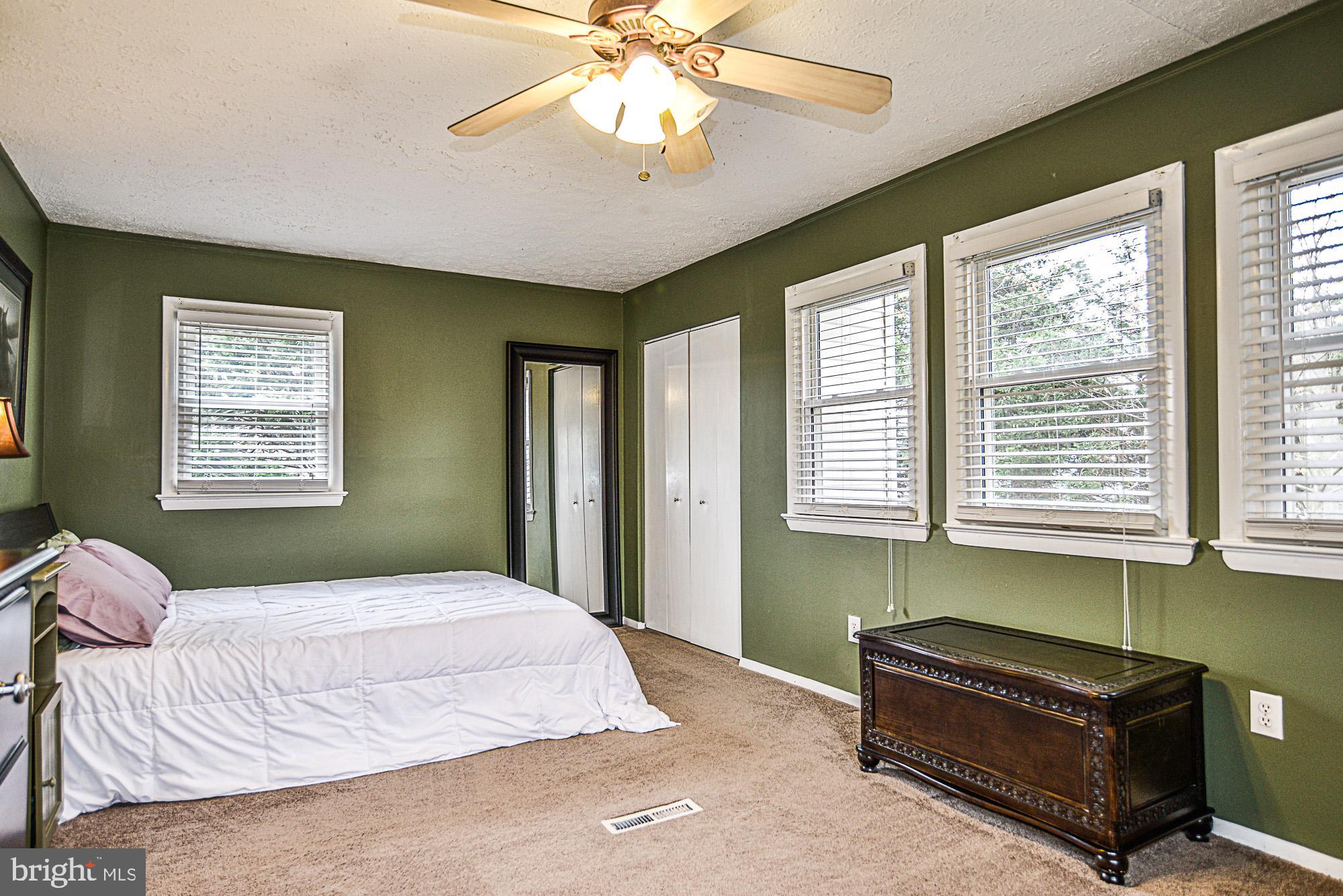 8608 Artillery Road Manassas, VA 20110 - Photo 26 of 31 MASTER BEDROOM WITH LIGHTED FAN