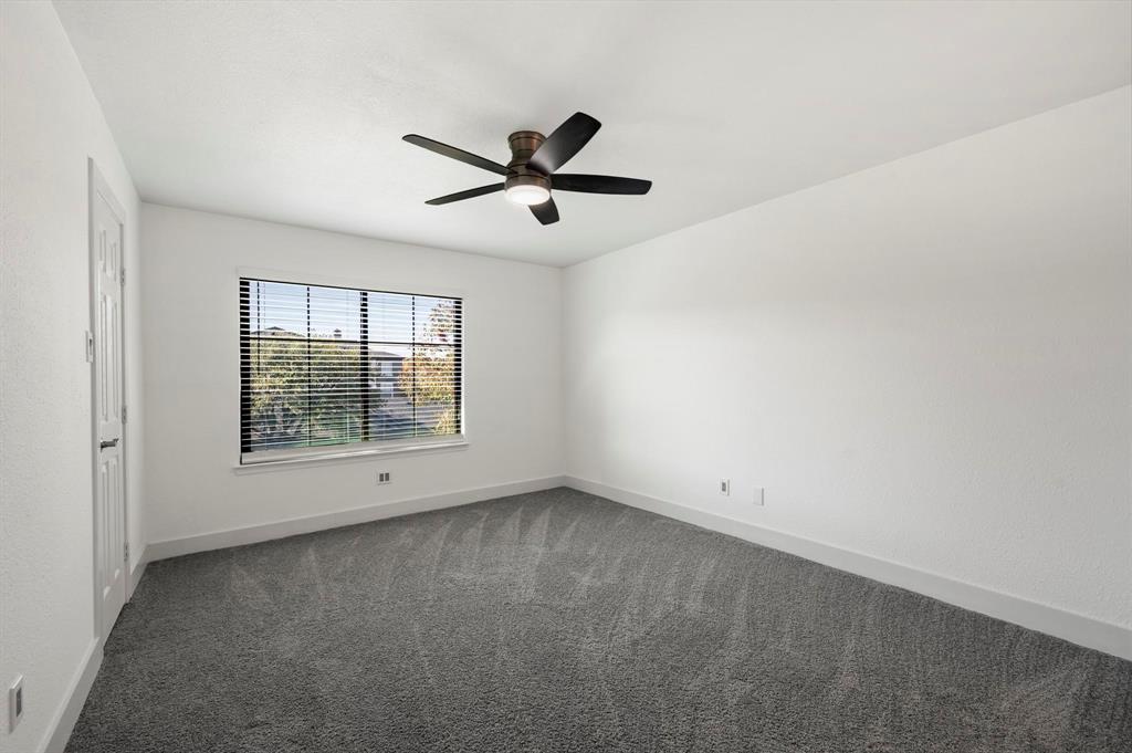 4247 Madera Road Irving, TX 75038 - Photo 18 of 28 a view of an empty room with a window