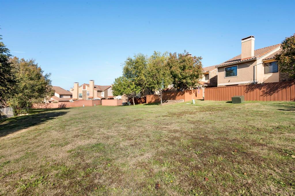 4247 Madera Road Irving, TX 75038 - Photo 26 of 28 a view of a street with houses