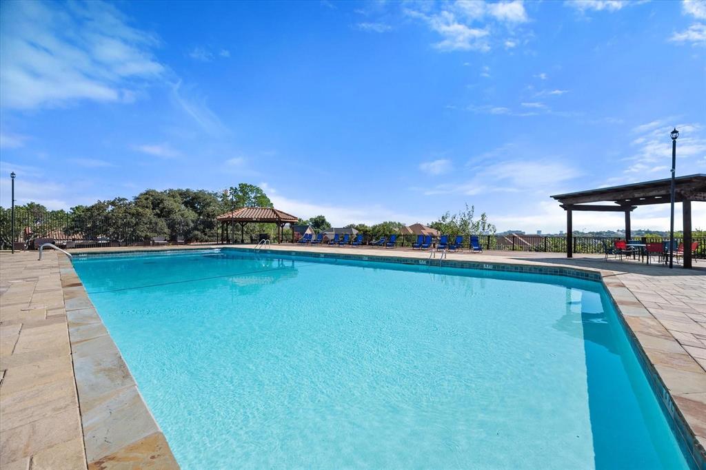4247 Madera Road Irving, TX 75038 - Photo 27 of 28 a view of a balcony with an ocean