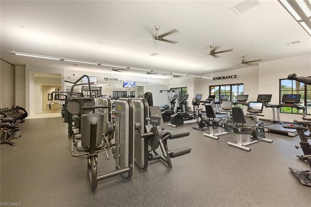 9365 Pocida Court, Unit 202 Naples, FL 34119 - Photo 39 of 40 a view of a room with gym equipment