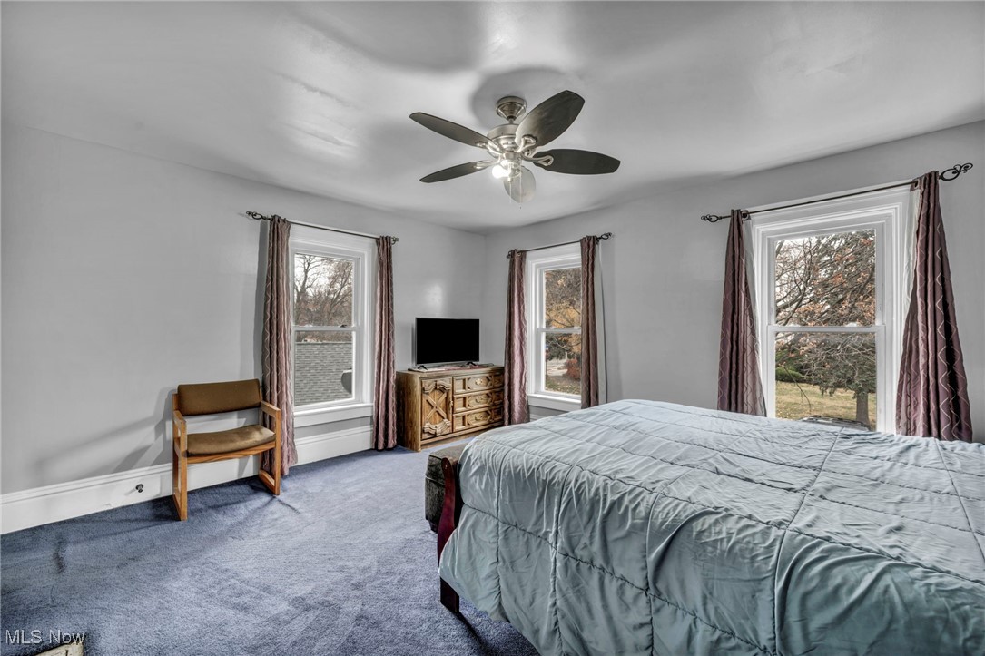 4743 Broadale Road Cleveland, OH 44109 - Photo 16 of 32 Bedroom with carpet and ceiling fan