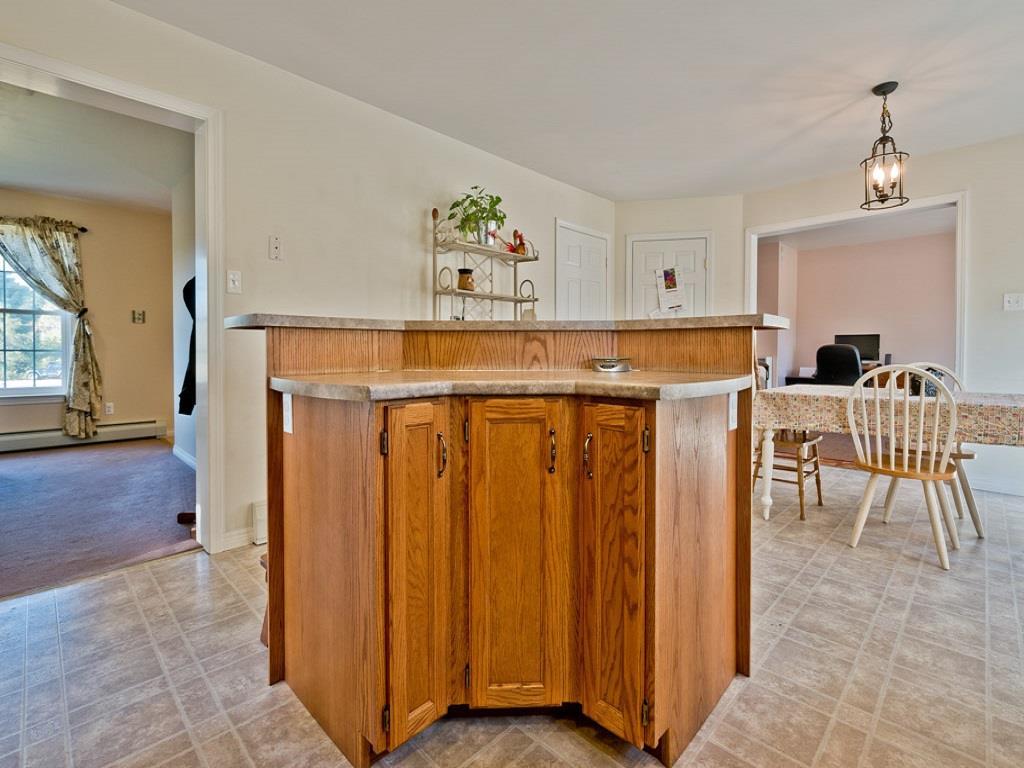 13 Montgomery Road Windham, ME 04062 - Photo 5 of 26 Three bar stools can cozy up to this...