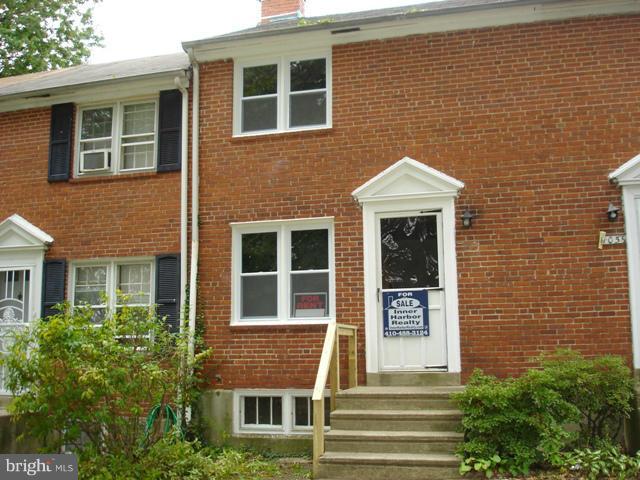 1061 Cameron Road Baltimore, MD 21212 - Photo 1 of 8 a front view of a house