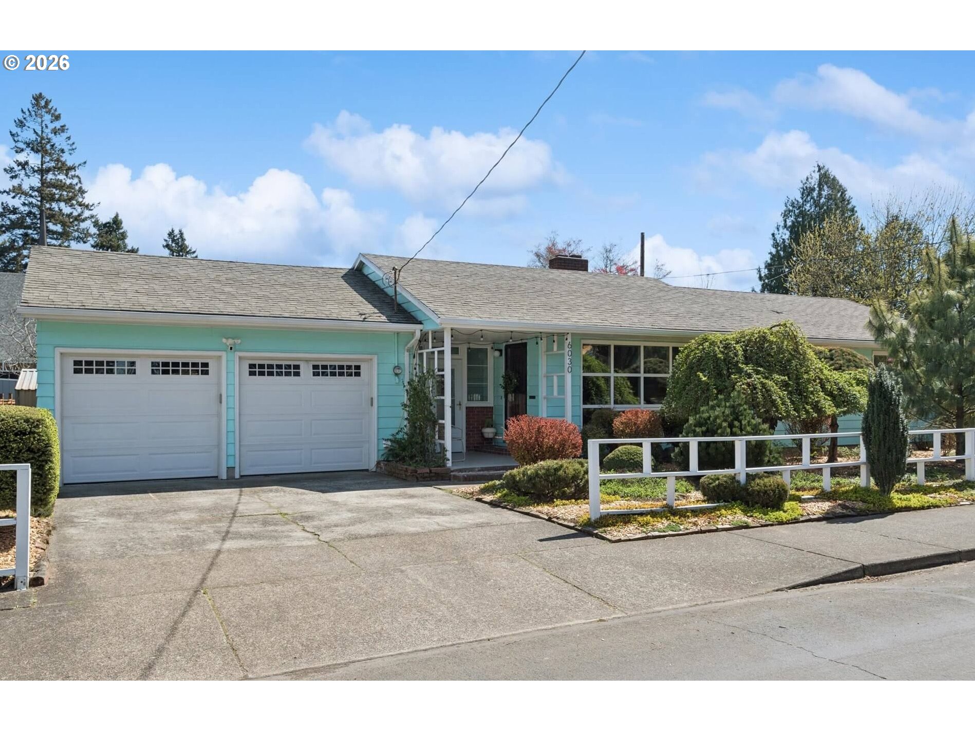 6030 Southeast 80th Avenue Portland, OR 97206 - Photo 1 of 42 a house view with a sitting space