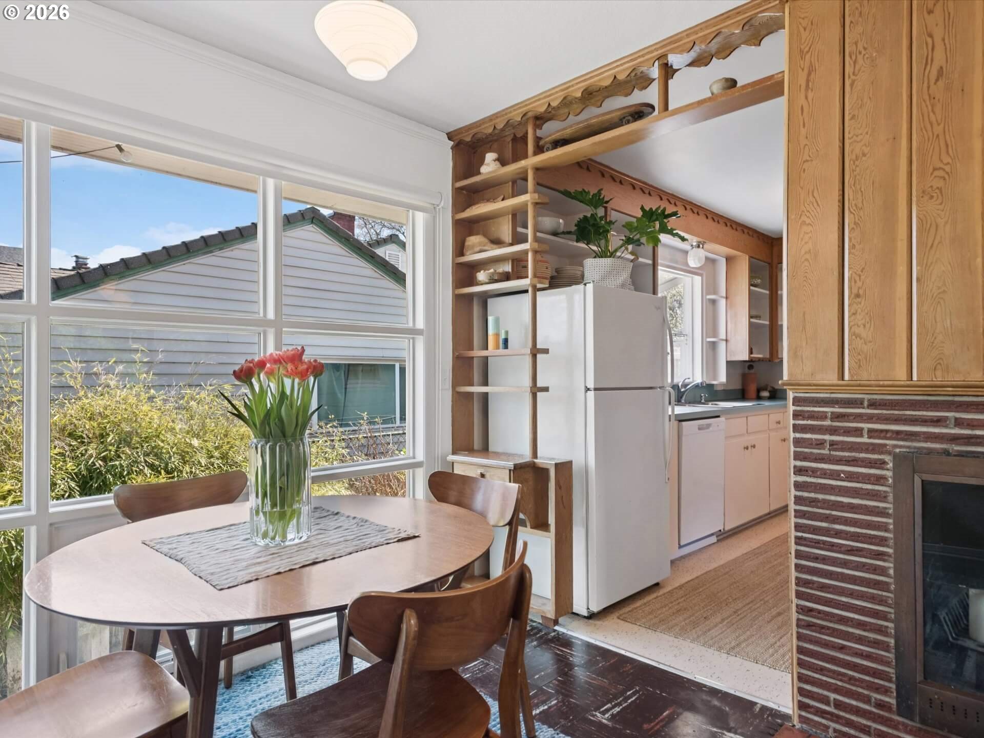 6030 Southeast 80th Avenue Portland, OR 97206 - Photo 13 of 42 a view of a dining table and chairs in the patio