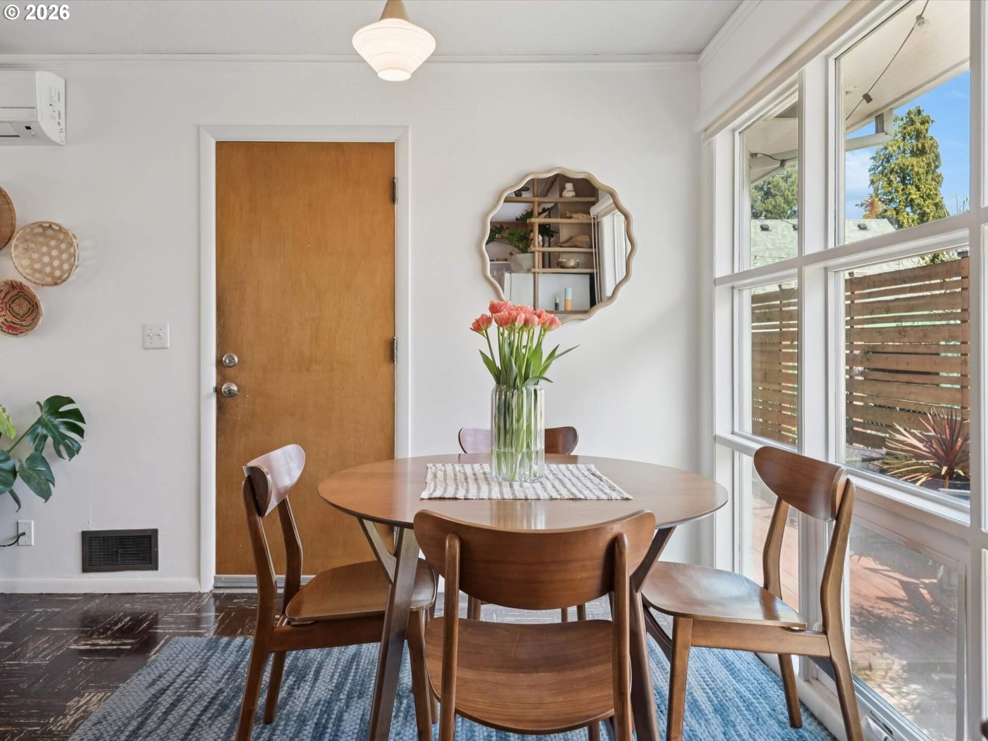 6030 Southeast 80th Avenue Portland, OR 97206 - Photo 19 of 42 a view of a dining room with furniture and a potted plant
