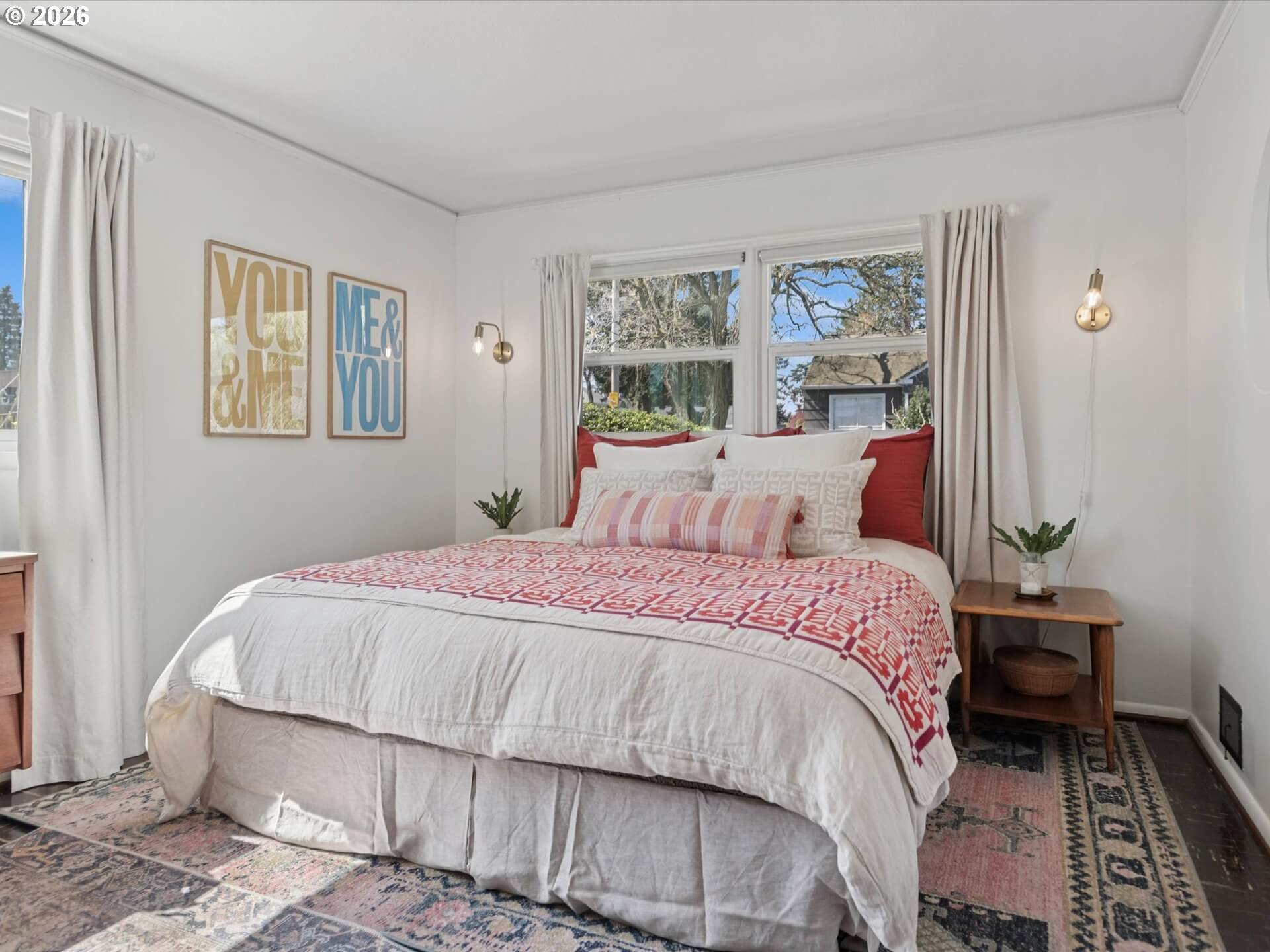 6030 Southeast 80th Avenue Portland, OR 97206 - Photo 22 of 42 a bedroom with a bed and a painting on the wall