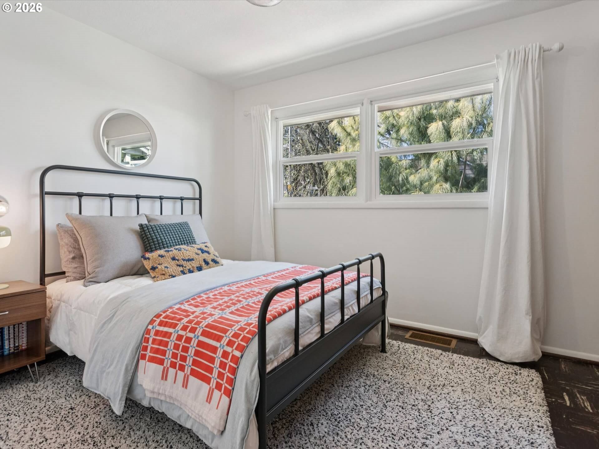 6030 Southeast 80th Avenue Portland, OR 97206 - Photo 25 of 42 a bedroom with a bed and a window