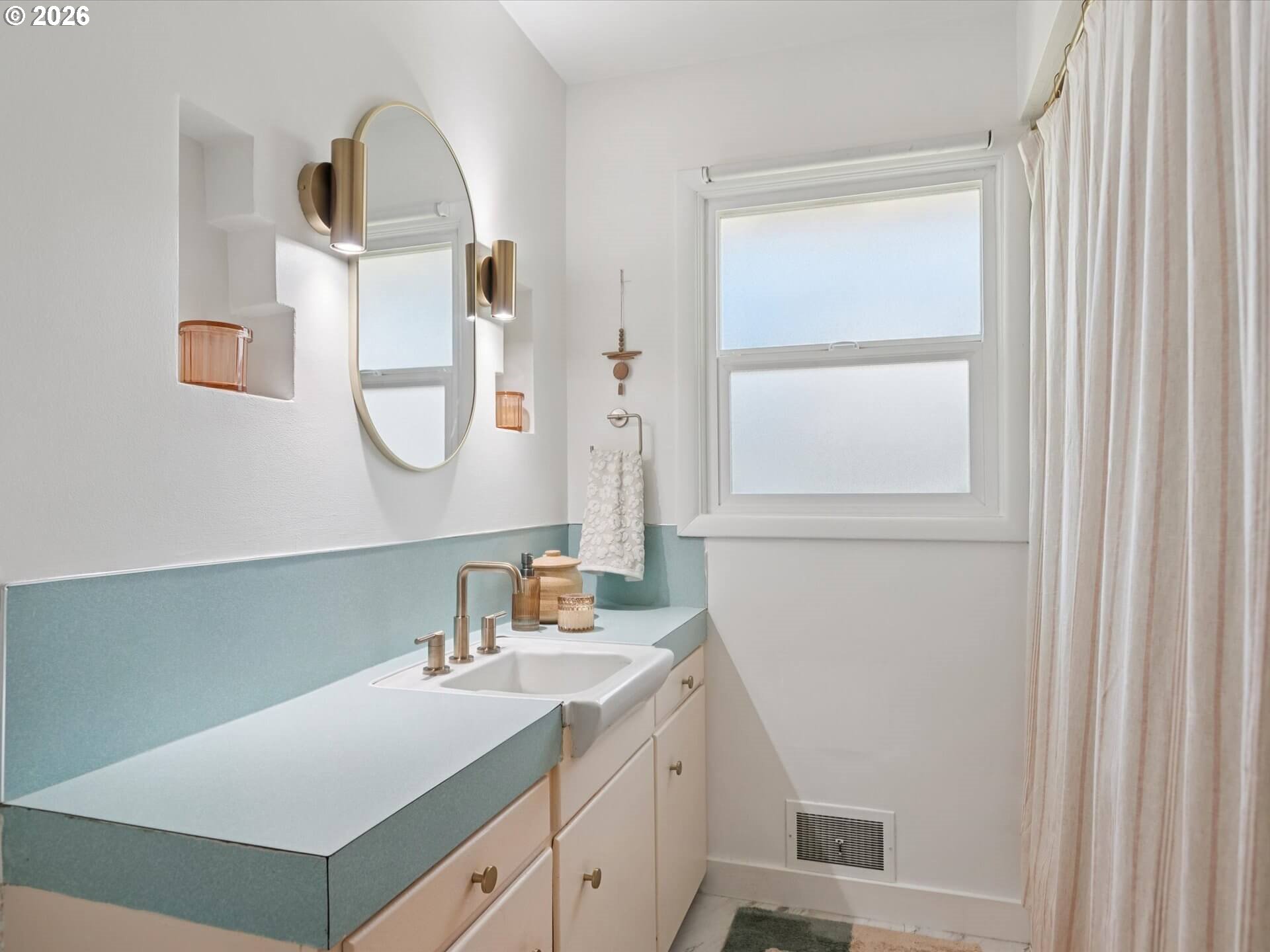 6030 Southeast 80th Avenue Portland, OR 97206 - Photo 28 of 42 a bathroom with a sink and a mirror