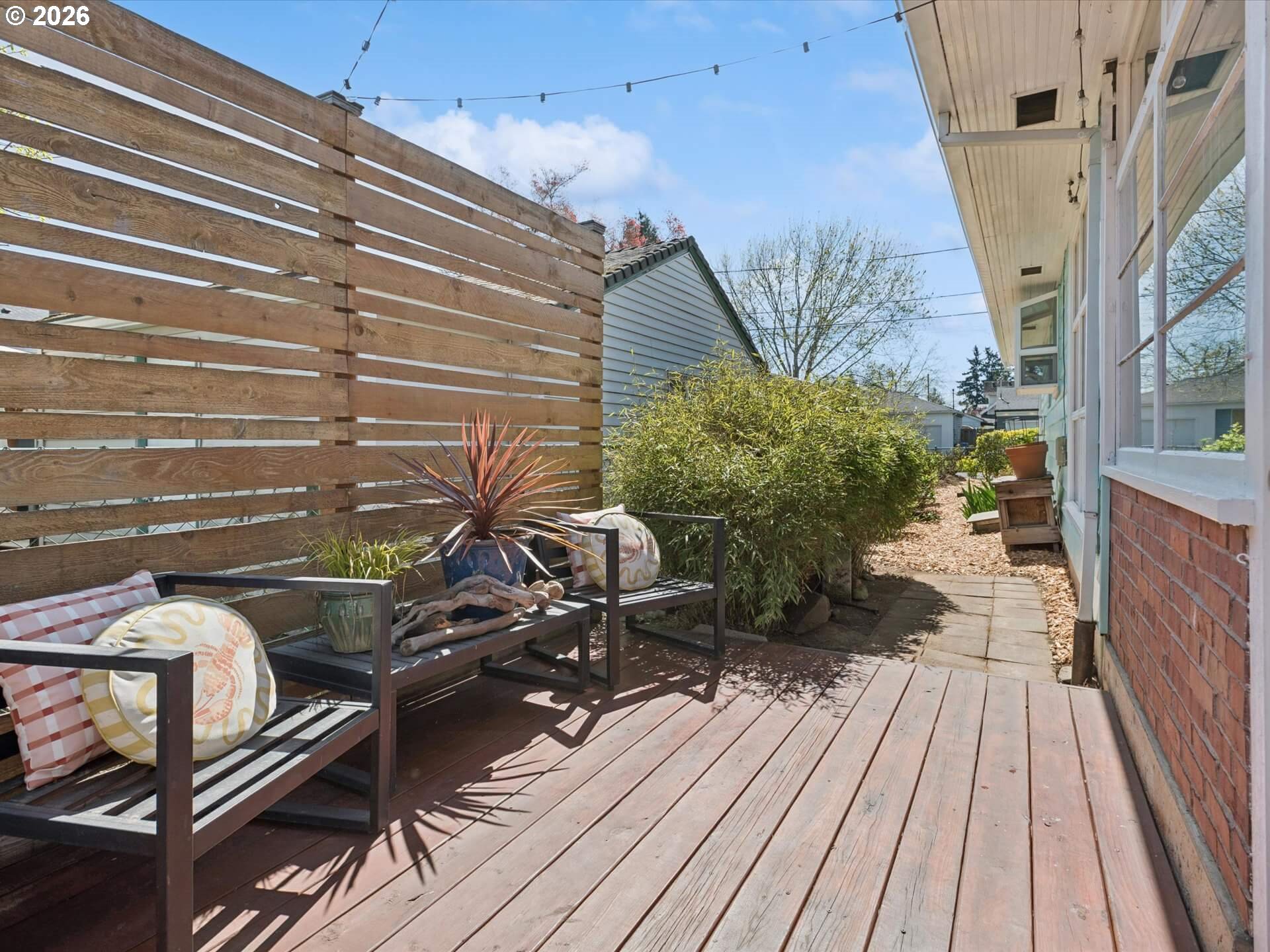 6030 Southeast 80th Avenue Portland, OR 97206 - Photo 36 of 42 a view of a balcony with chairs and wooden floor