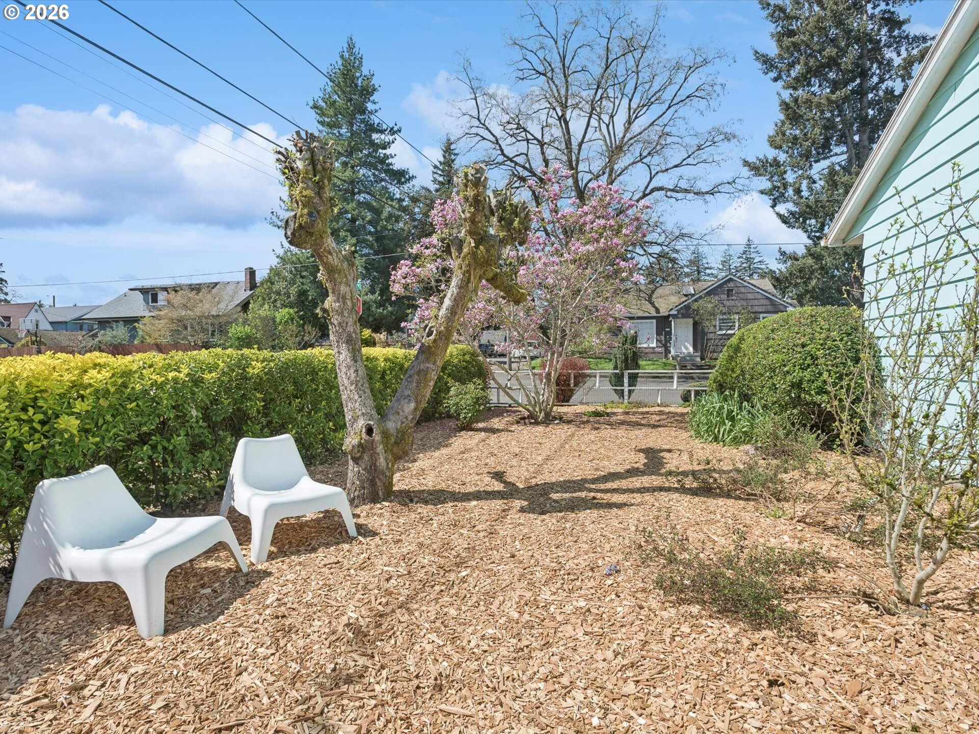 6030 Southeast 80th Avenue Portland, OR 97206 - Photo 38 of 42 a view of a chairs and table in backyard