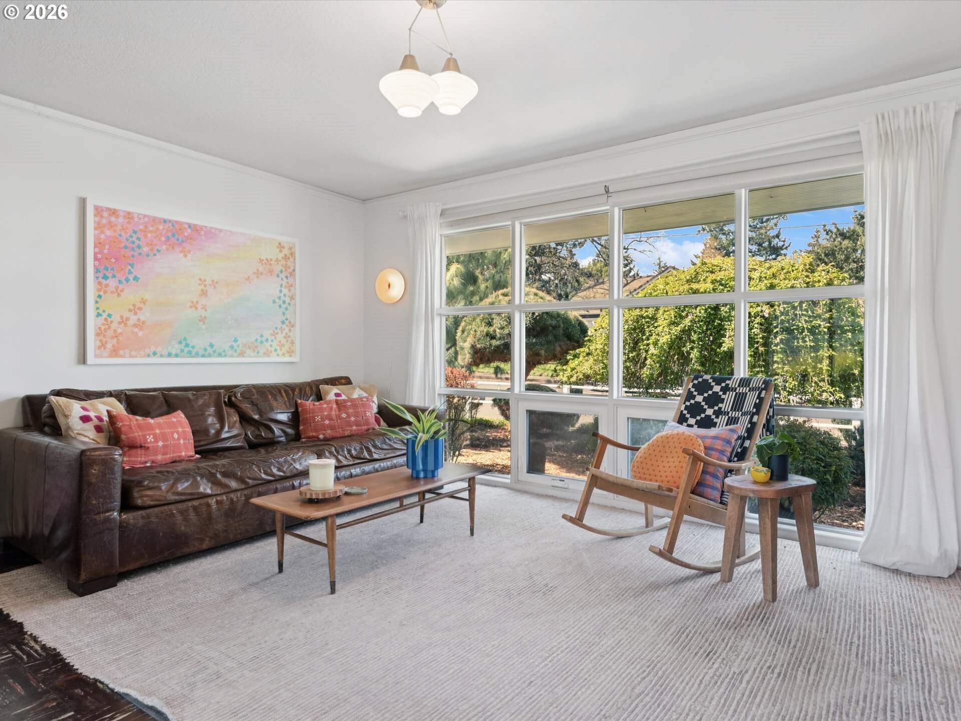 6030 Southeast 80th Avenue Portland, OR 97206 - Photo 7 of 42 a living room with furniture and a large window