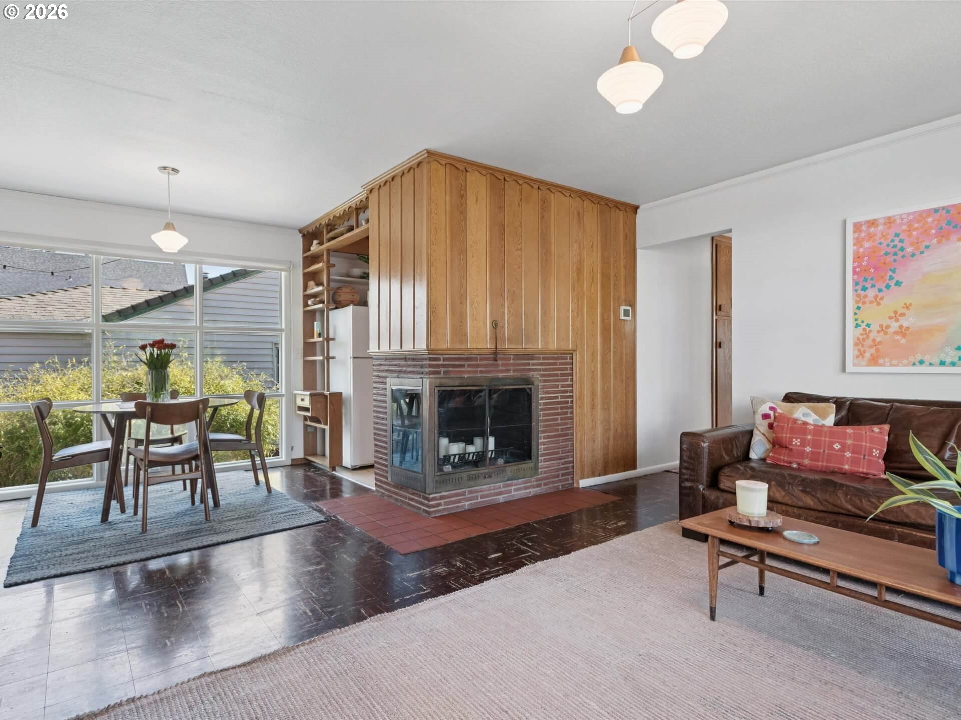 6030 Southeast 80th Avenue Portland, OR 97206 - Photo 9 of 42 a living room with furniture and a fireplace
