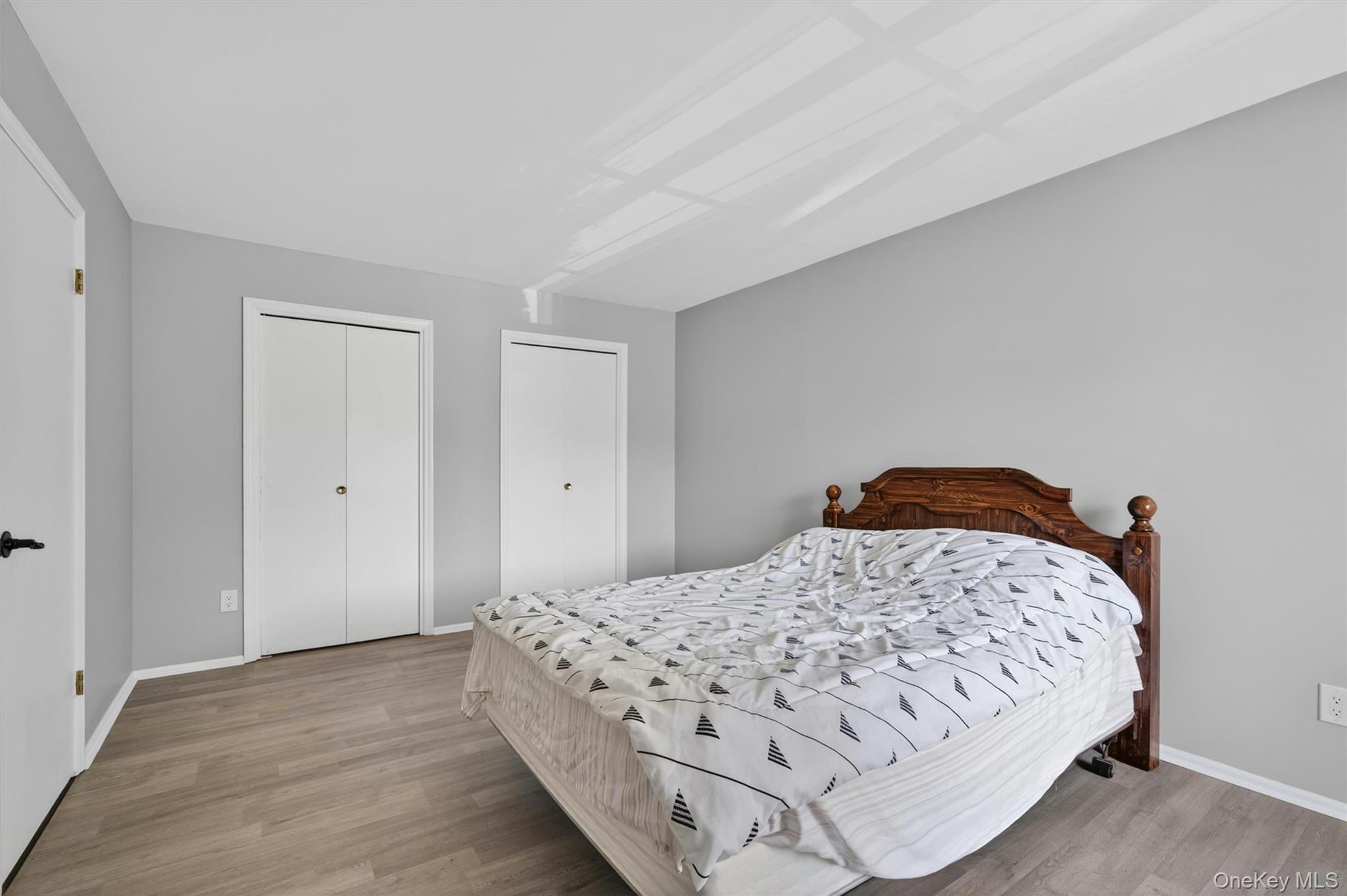 43 The Rise Warwick, NY 10990 - Photo 5 of 49 a bedroom with a bed and a closet