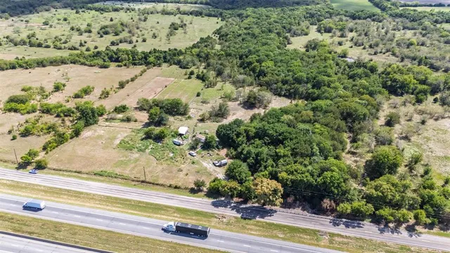 a view of a garden with a fountain
