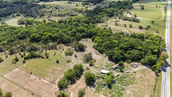 a view of a garden with a pathway