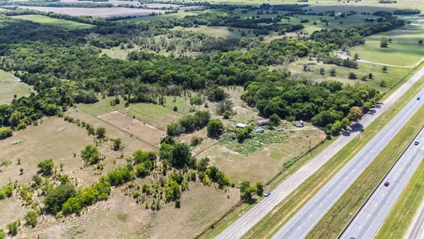 a view of a backyard of a house