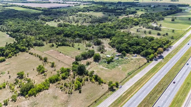 a view of a backyard of a house