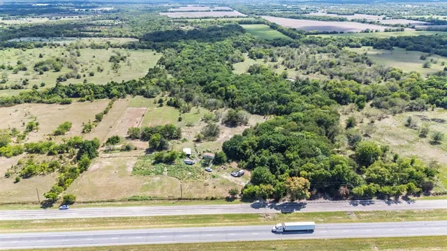 a view of a yard with an outdoor space