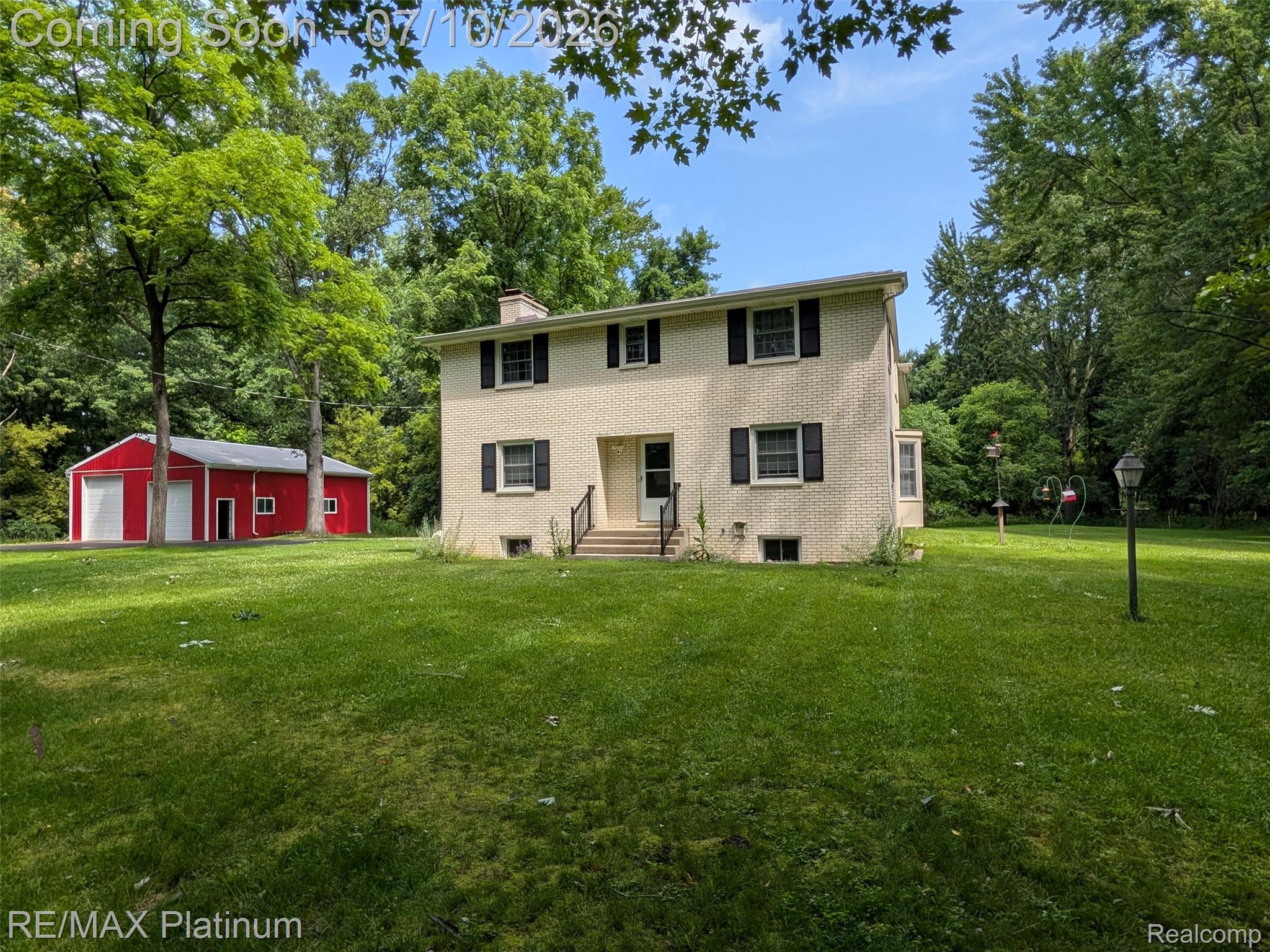 1430 Dauner Road Fenton, MI 48430 - Photo 1 of 41 Classic two-story brick colonial estate on 8.45 wooded acres, pole barn and shed.