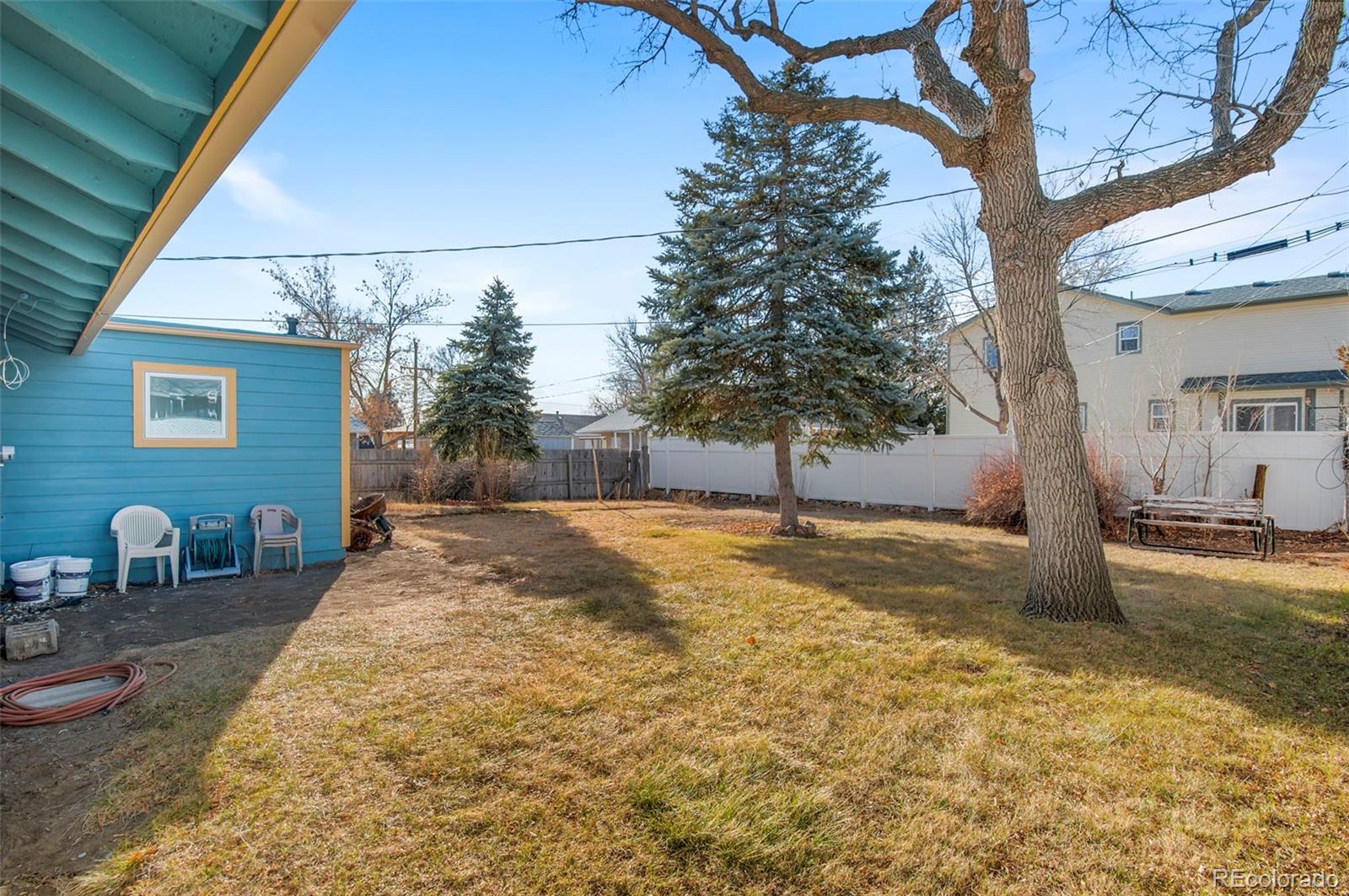 7483 Knox Court Westminster, CO 80030 - Photo 30 of 35 a view of back yard of the house