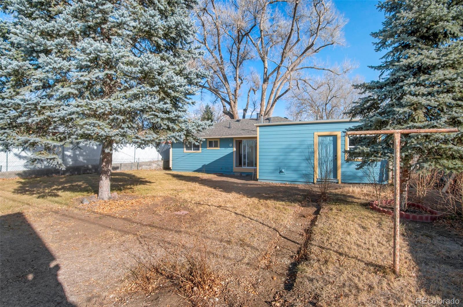7483 Knox Court Westminster, CO 80030 - Photo 34 of 35 a view of backyard of house