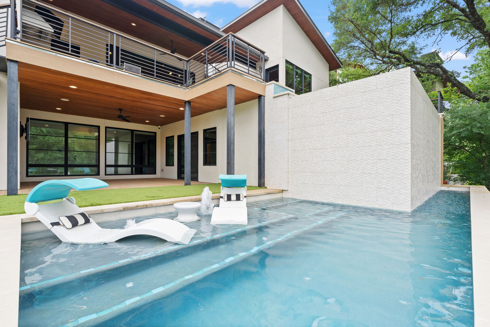 604 Brookhaven Trail Austin, TX 78746 - Photo 32 of 38 The pool on the lower level.