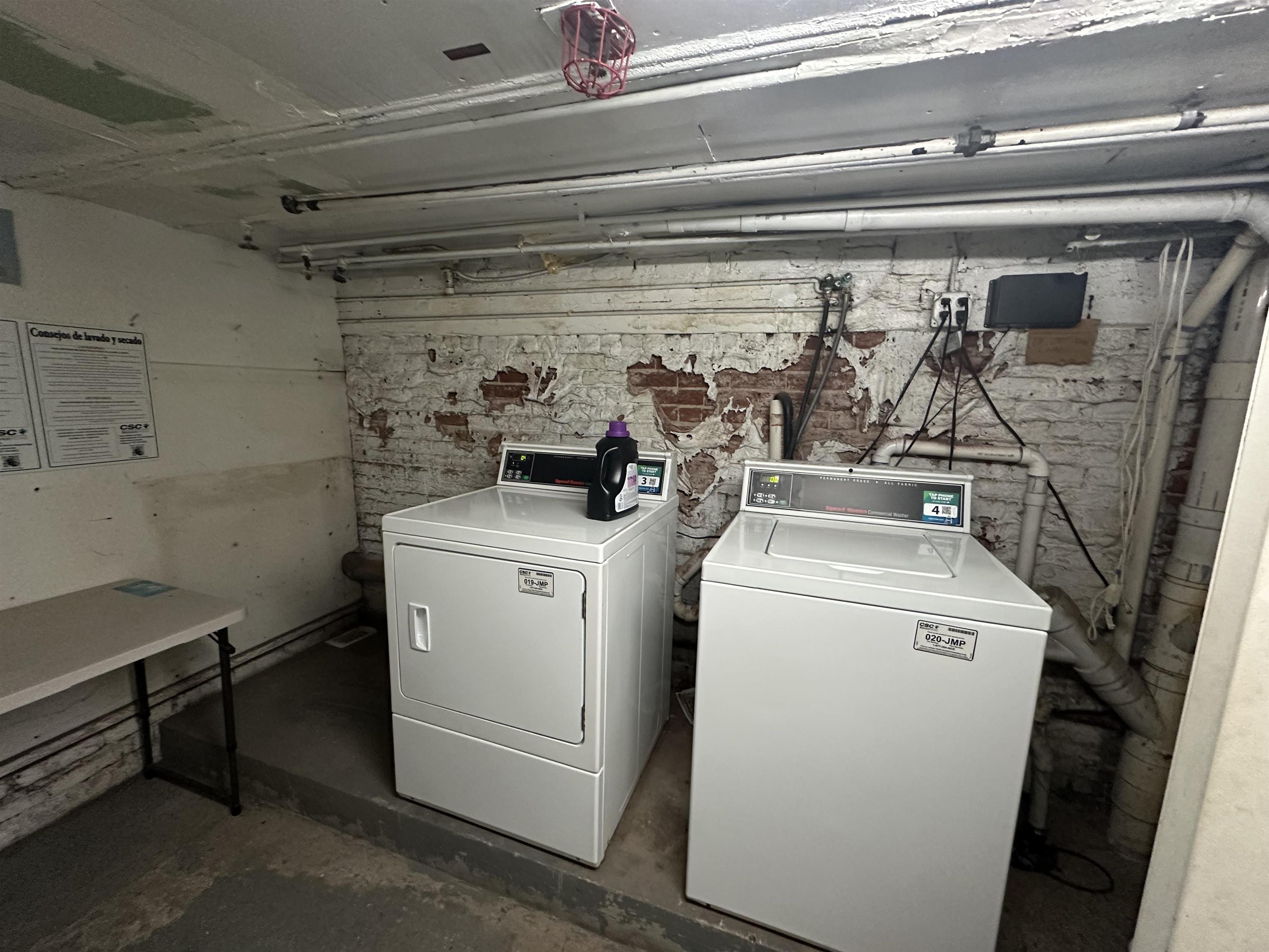 112 Jefferson Street, Unit 2S Hoboken, NJ 07030 - Photo 11 of 13 a utility room with dryer and washer