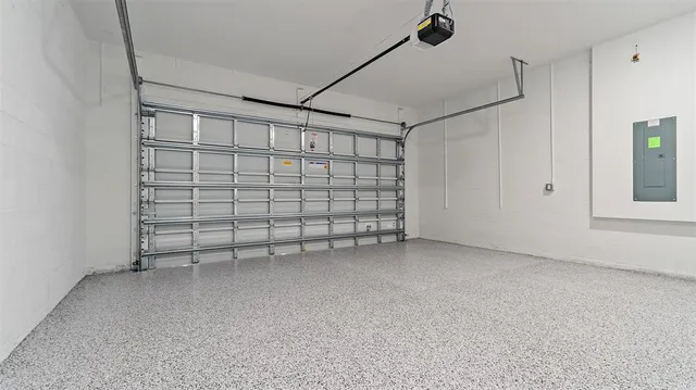 a view of a house with backyard and garden