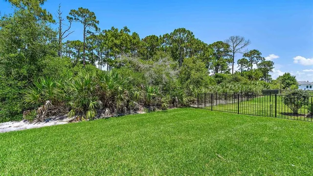 an aerial view of a house with pool lake view and mountain view