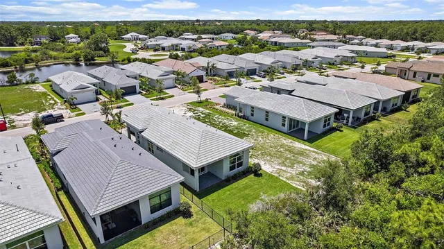 a view of a city with mountains in the background