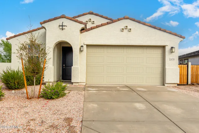 a view of entrance gate of a house