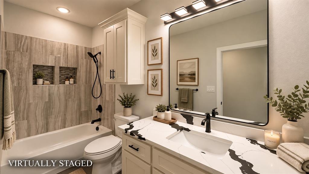 302-304 West Pine Street Whitewright, TX 75491 - Photo 23 of 38 Bathroom featuring a tub/shower combination with tile surround and built-in niches