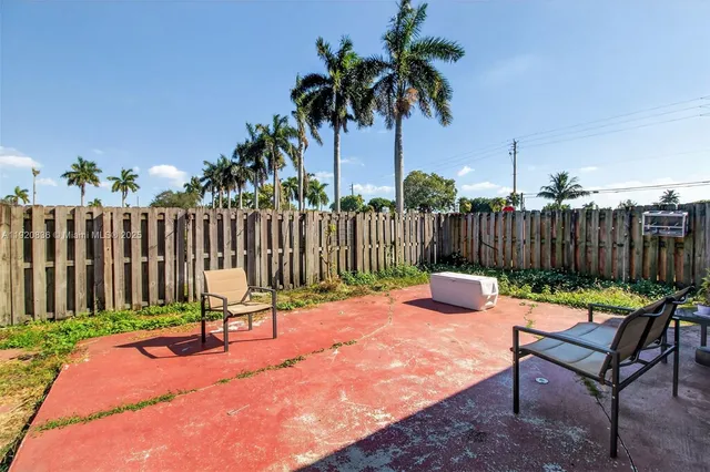 a view of a bench in the garden