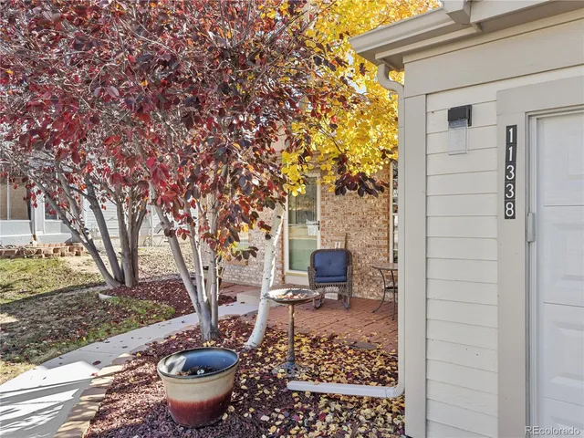 a view of a patio with chair and table