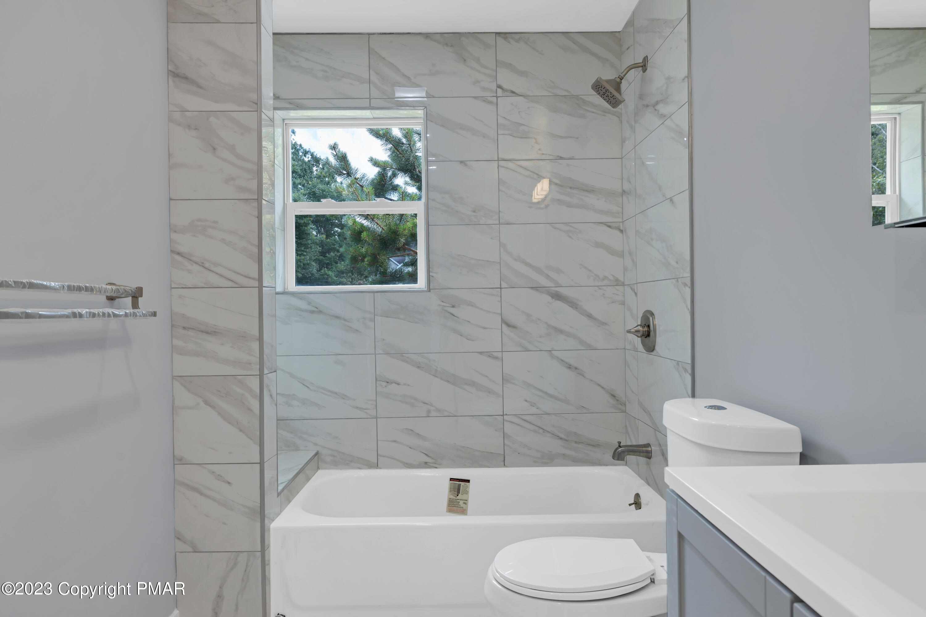 209 Ryan Road Blakeslee, PA 18610 - Photo 15 of 54 a bathroom with a toilet and a shower