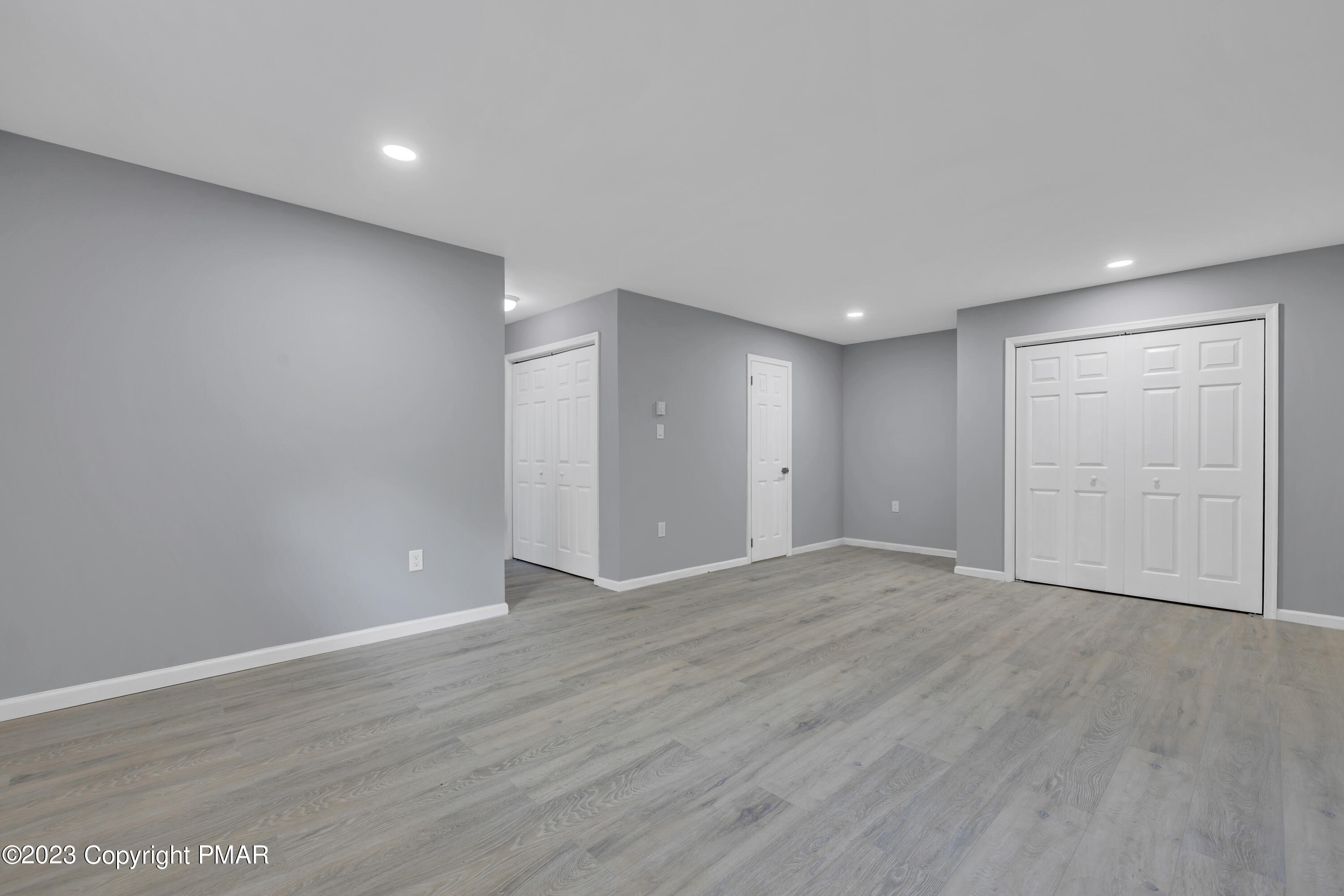 209 Ryan Road Blakeslee, PA 18610 - Photo 23 of 54 a view of an empty room with wooden floor