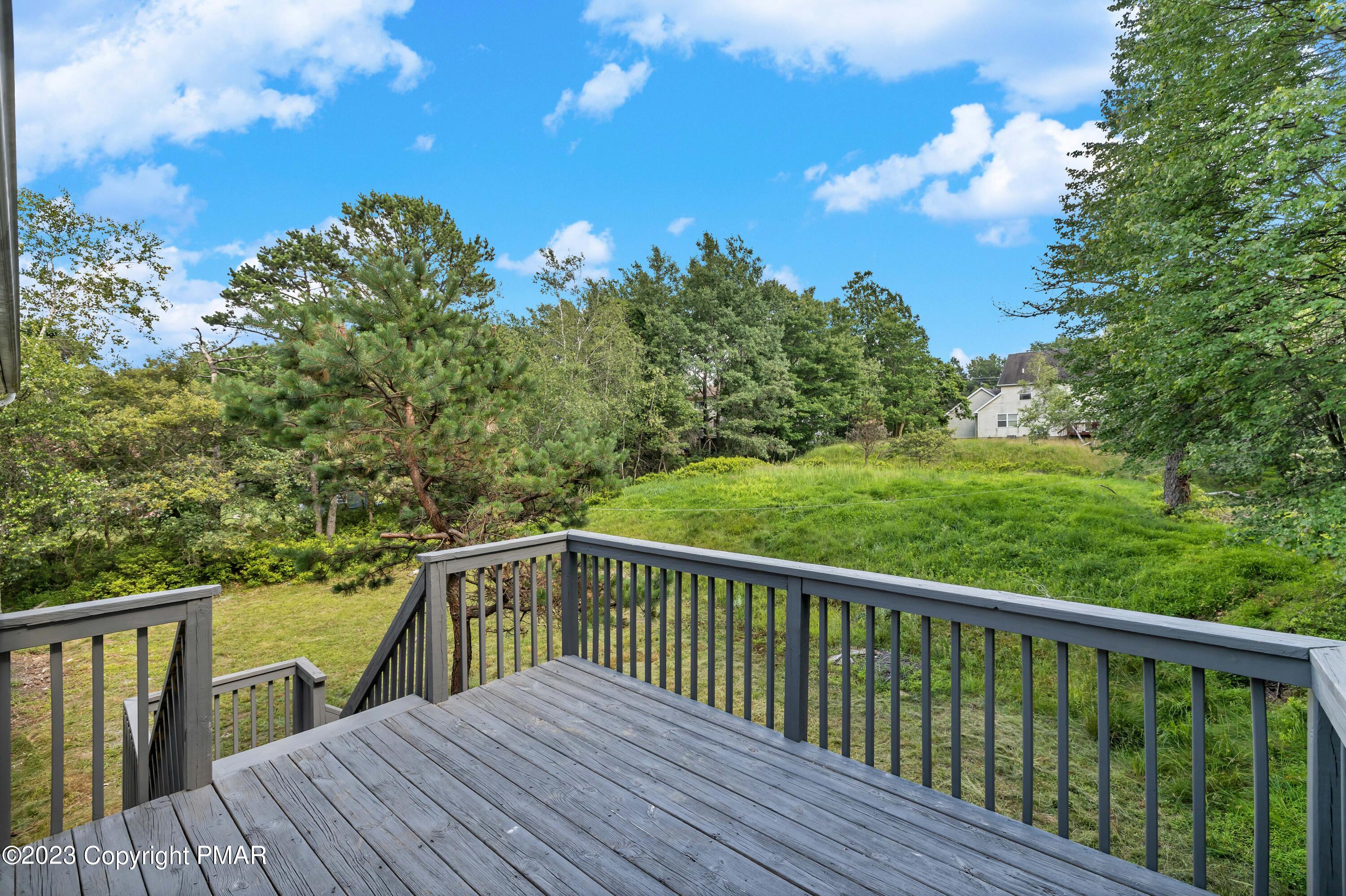 209 Ryan Road Blakeslee, PA 18610 - Photo 31 of 54 a view of balcony with wooden floor and fence