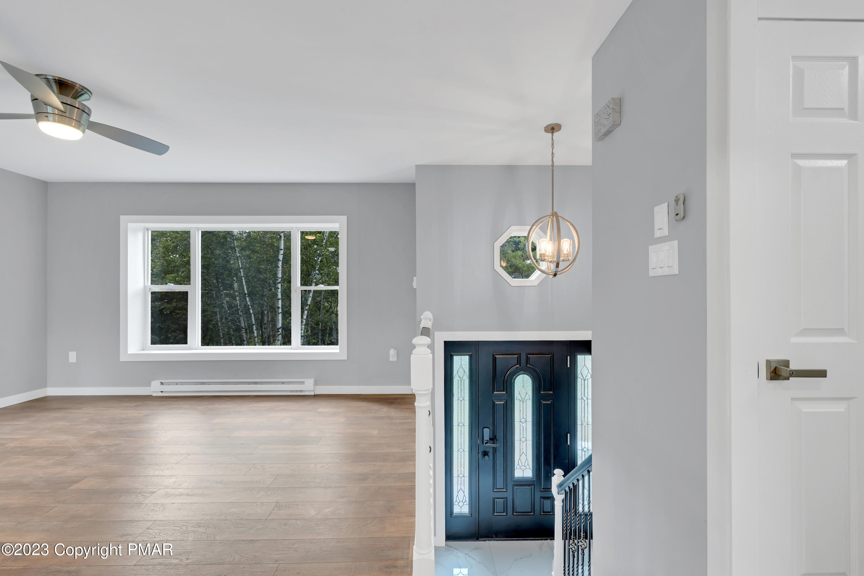 209 Ryan Road Blakeslee, PA 18610 - Photo 5 of 54 a view of an entryway with wooden floor and a window