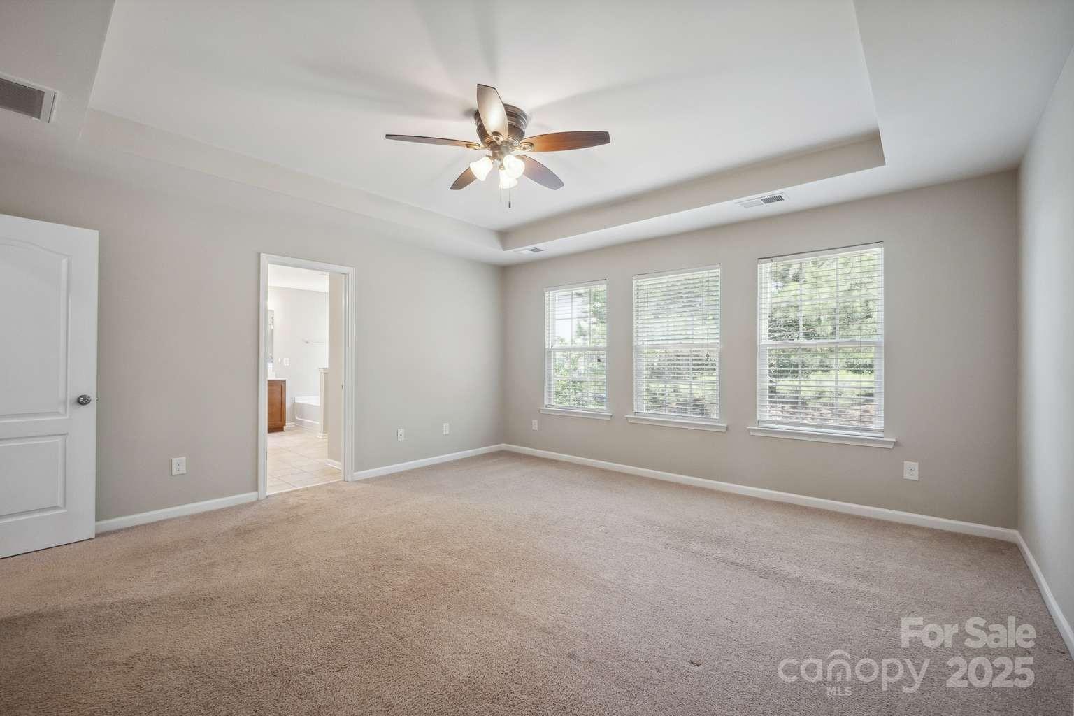 128 Yellowbell Road Mooresville, NC 28117 - Photo 13 of 19 a view of an empty room with a window