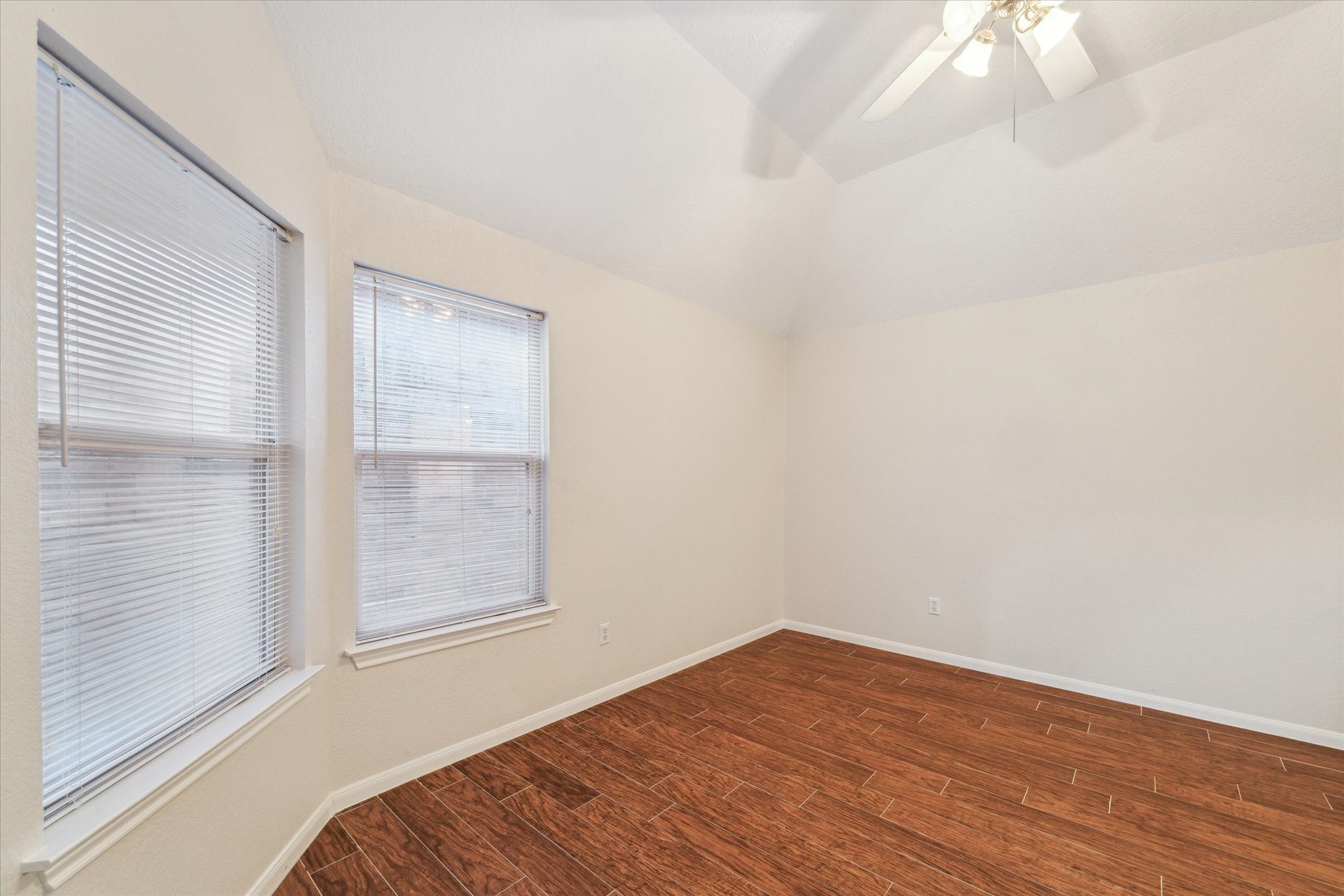 2806 Crescent Star Road Spring, TX 77388 - Photo 15 of 23 a view of a livingroom with wooden floor and a window