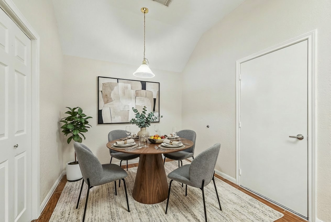 2806 Crescent Star Road Spring, TX 77388 - Photo 10 of 23 a dining room with furniture and wooden floor