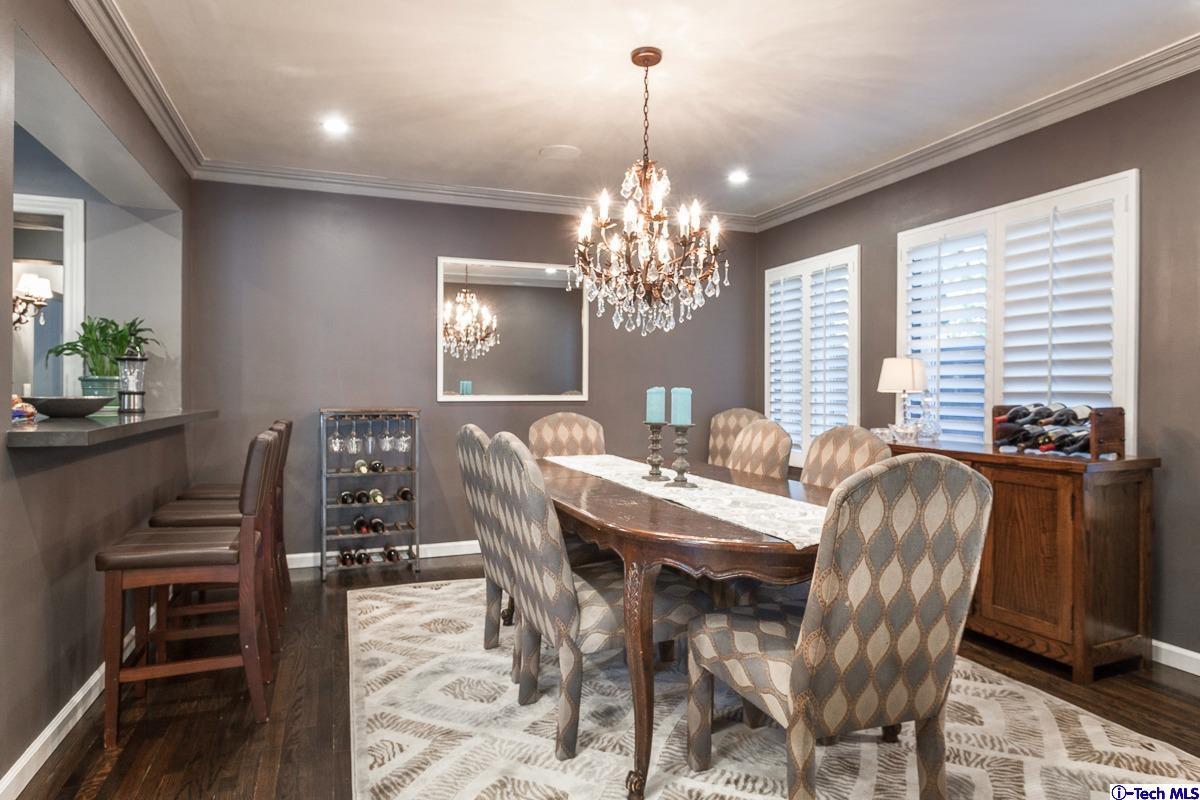 2017 Midwick Drive Altadena, CA 91001 - Photo 17 of 61 a view of a dining room with furniture and chandelier